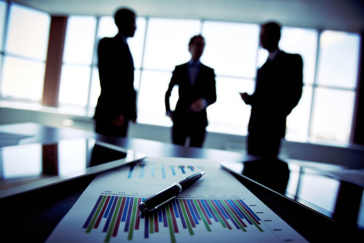 http://www.dreamstime.com/stock-photography-business-trio-shadowy-holding-briefing-concerning-reported-statistic-data-image33941802